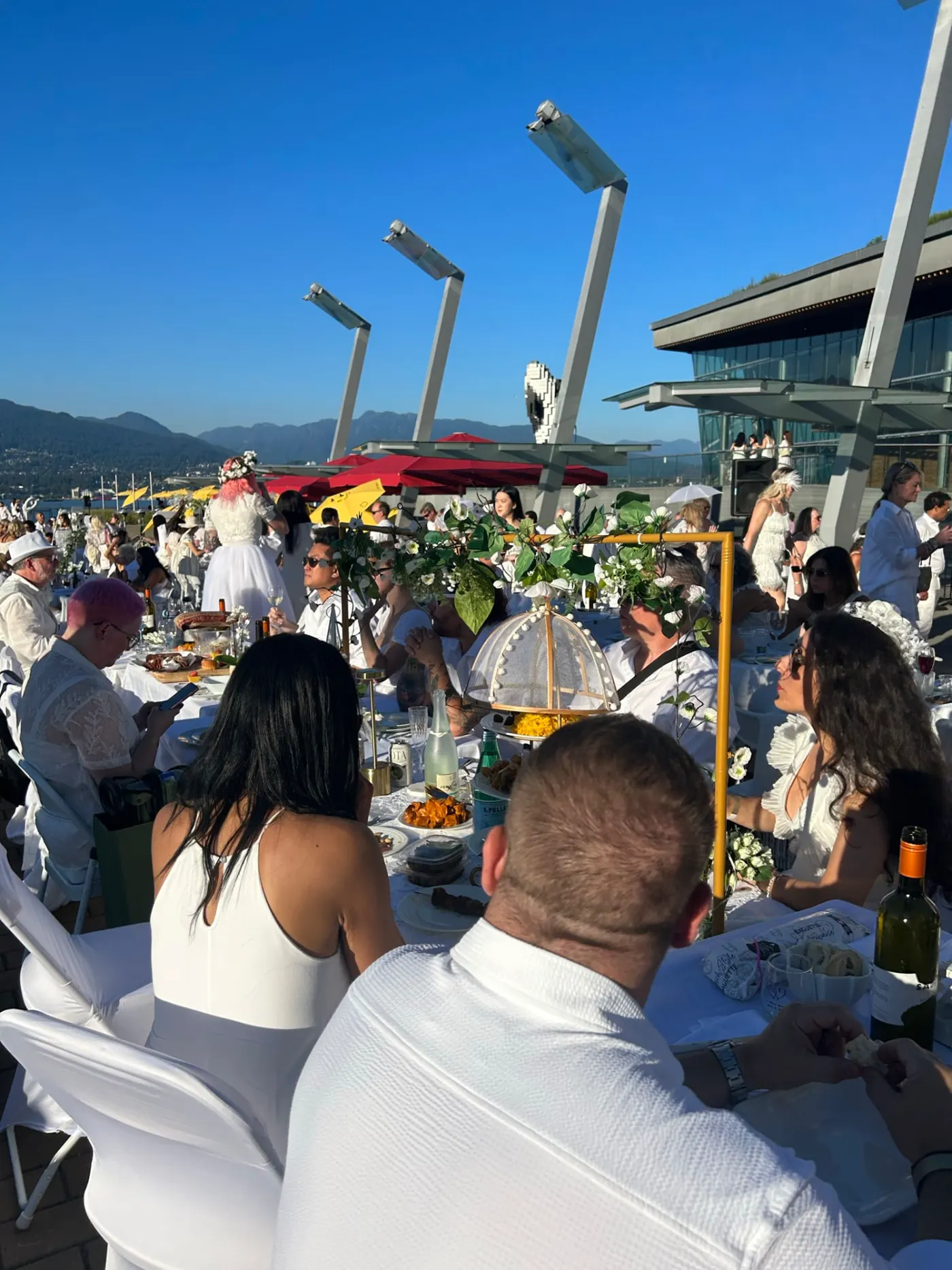 Guests dressed in white at Dinner en Blanc Vancouver