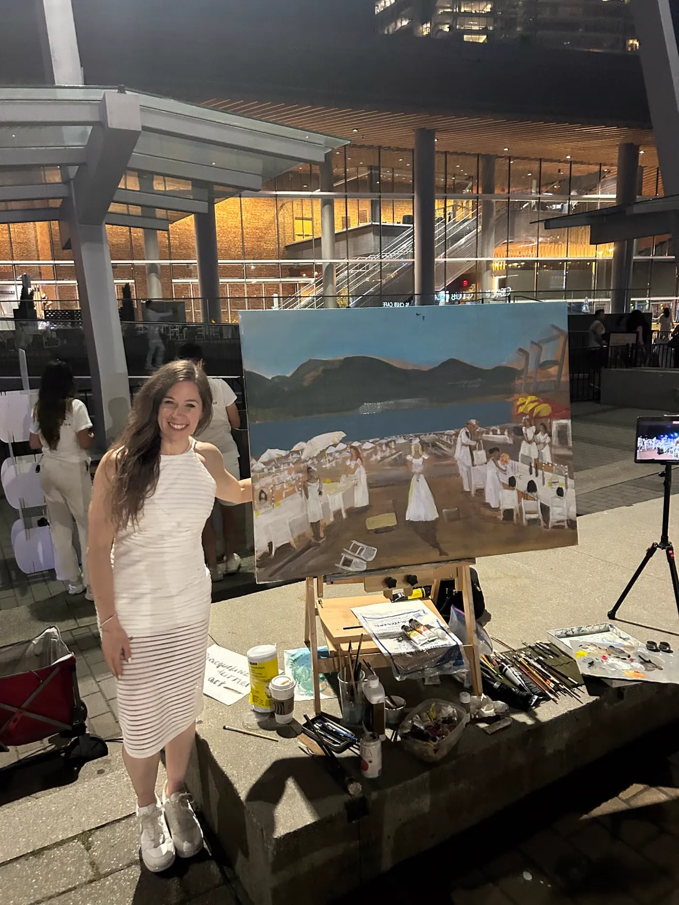 Jacqueline Turner beside her finished Dinner en Blanc Vancouver live painting