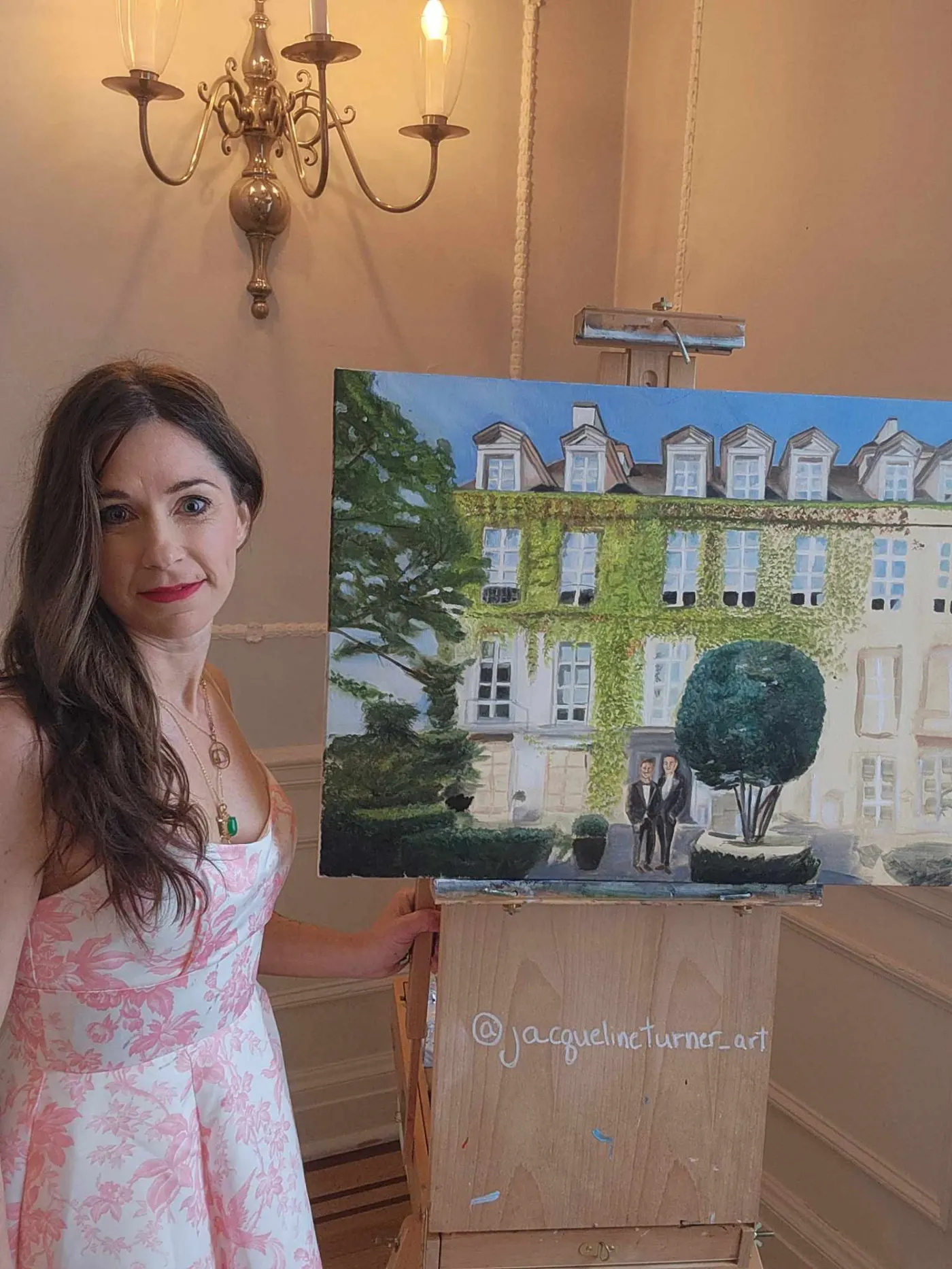 Jacqueline Turner with the finished wedding painting at The Vancouver Club
